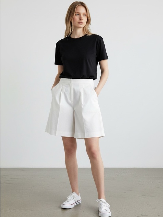 lululemon athletica Pants - Lululemon High Rise Pleated Shorts - White ( definitely longer on the model )